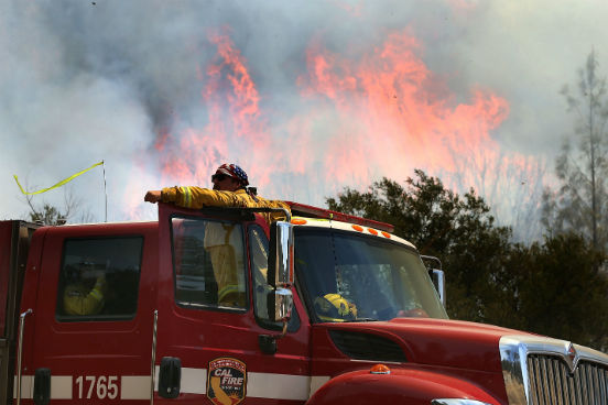 O trabalho agressivo dos bombeiros contra os incêndios continua e a previsão é de que o fogo seja extinto por completo somente no dia 10 de agosto. (Imagem: Getty Images) O trabalho agressivo dos bombeiros contra os incêndios continua e a previsão é de que o fogo seja extinto por completo somente no dia 10 de agosto. (Imagem: Getty Images)