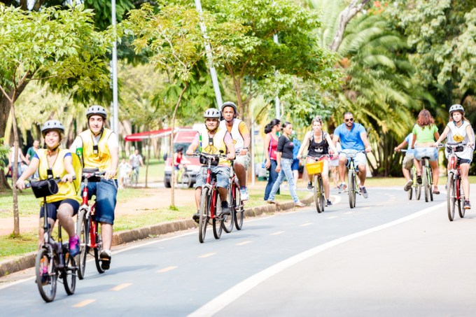 People riding bikes in Ibirapuera Park in Sao Paulo, Brazil