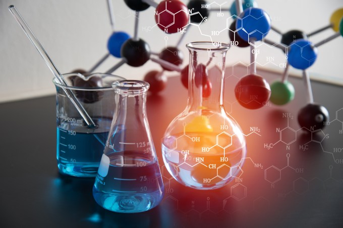 Digital Composite Image Of Liquids And Molecular Structure On Table