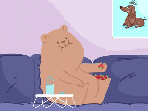 Lanche-saudavel Urso em desenho animado está sentado em um sofá enquanto joga frutinhas em sua boca.